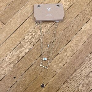 NWT American Eagle Gold-Tone Multi-Layer Necklace with Blue Accent Eye